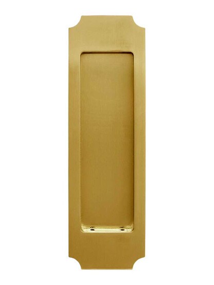 Chamfered Corner Pocket-Door Flush Pull in Aged Brass.